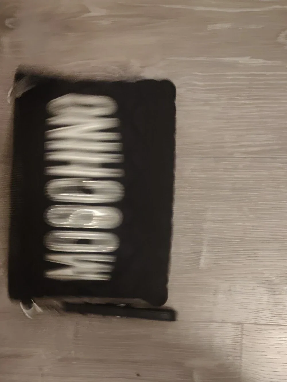 Moschino Black Quilted Wristlet with Shiny Silver Logo